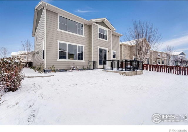 view of snow covered property