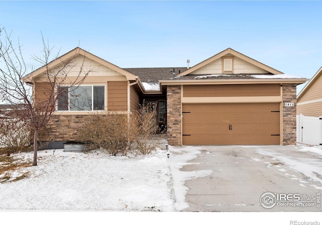 single story home with a garage