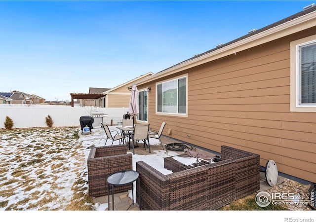 view of snow covered patio