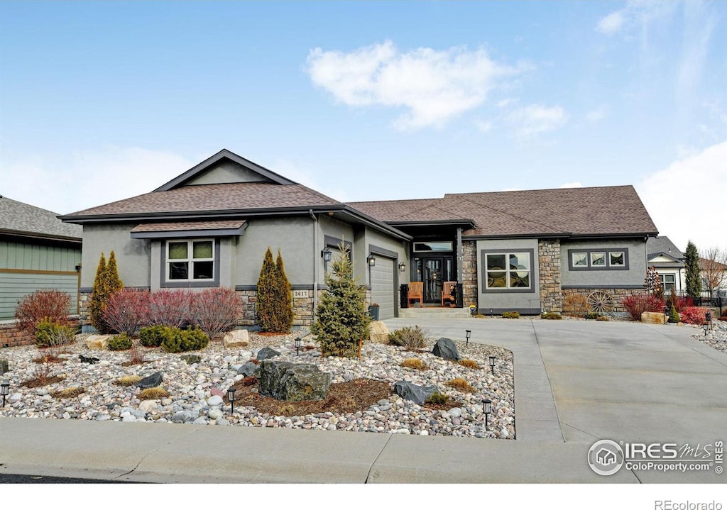 ranch-style home with a garage