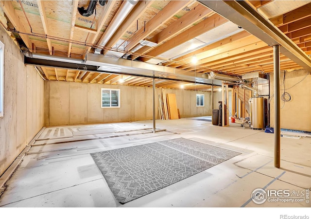 basement featuring water heater