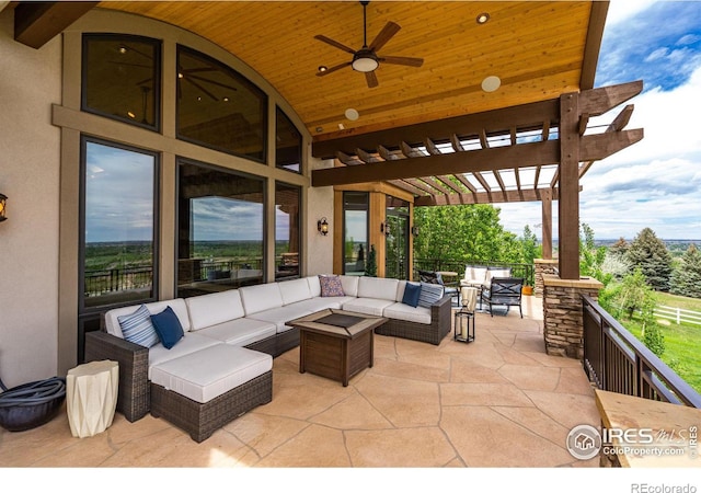 view of patio / terrace with a pergola, an outdoor living space, and ceiling fan