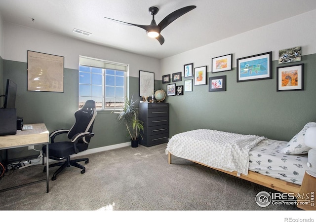 carpeted bedroom featuring ceiling fan