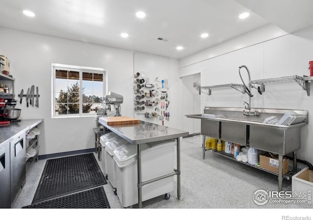 kitchen featuring stainless steel counters