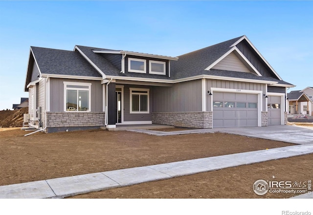 craftsman-style home with a garage