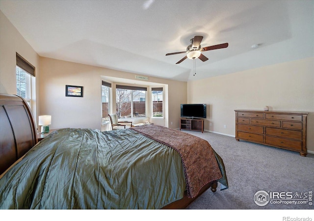 carpeted bedroom with ceiling fan