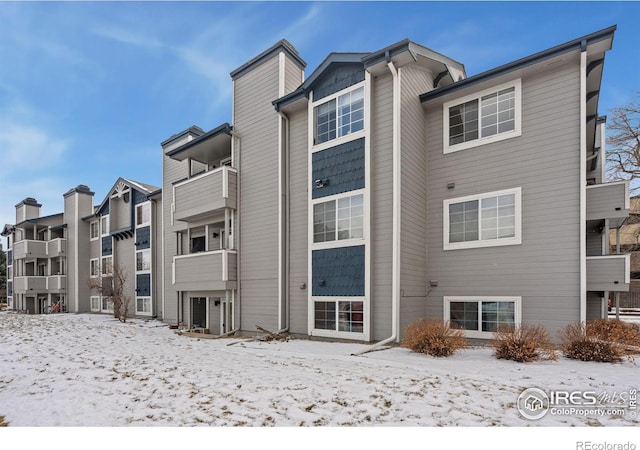 view of snow covered building