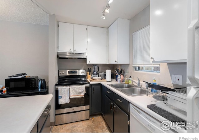 kitchen with white cabinetry, sink, rail lighting, and white appliances