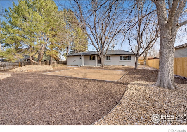 rear view of house featuring a patio area