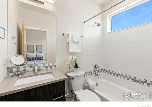 full bathroom with vanity, shower / bathtub combination, and toilet