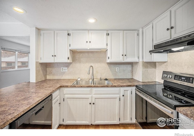 kitchen with stainless steel dishwasher, white cabinets, sink, and black range with electric cooktop