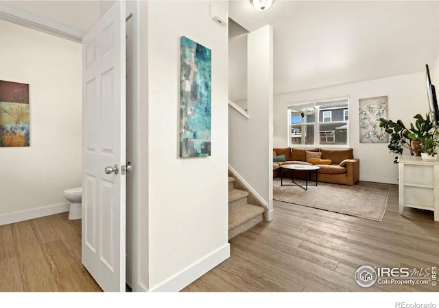 corridor featuring light hardwood / wood-style flooring