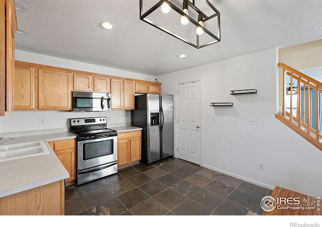 kitchen featuring sink and appliances with stainless steel finishes