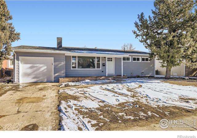 single story home featuring a garage