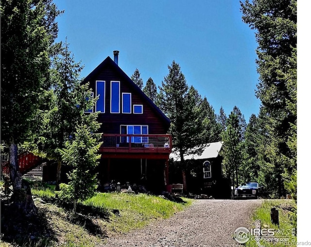 view of front of house featuring a deck