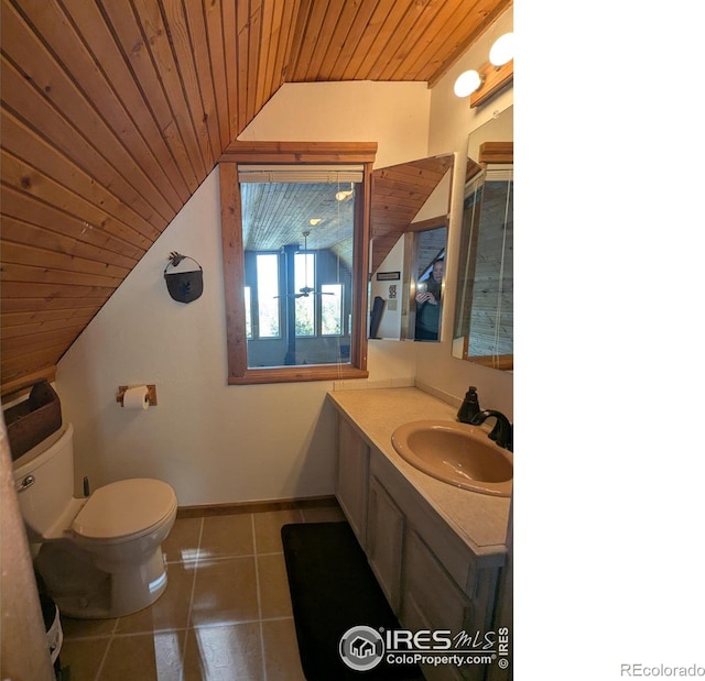 bathroom with vanity, wooden ceiling, lofted ceiling, tile patterned flooring, and toilet