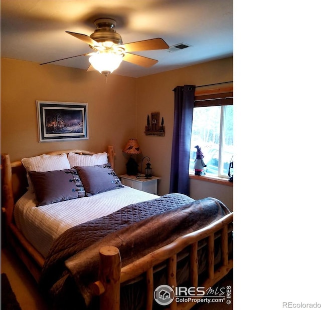 bedroom featuring ceiling fan