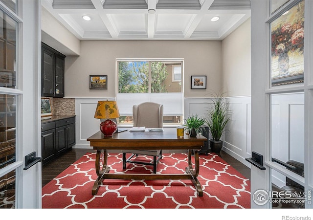 office with beamed ceiling, ornamental molding, dark hardwood / wood-style flooring, and coffered ceiling