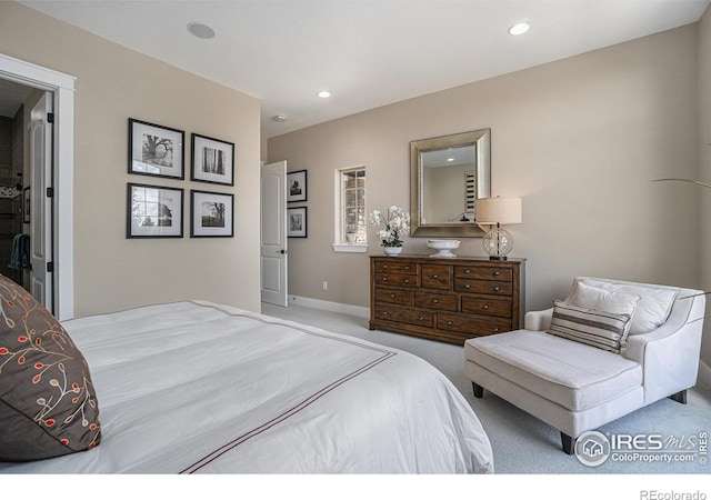 bedroom featuring light colored carpet