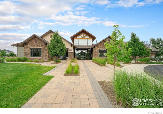 view of front of property with a front lawn