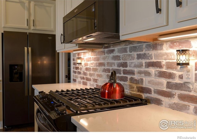 kitchen with black appliances