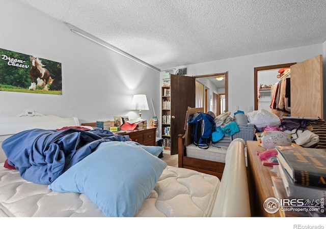 bedroom with a textured ceiling