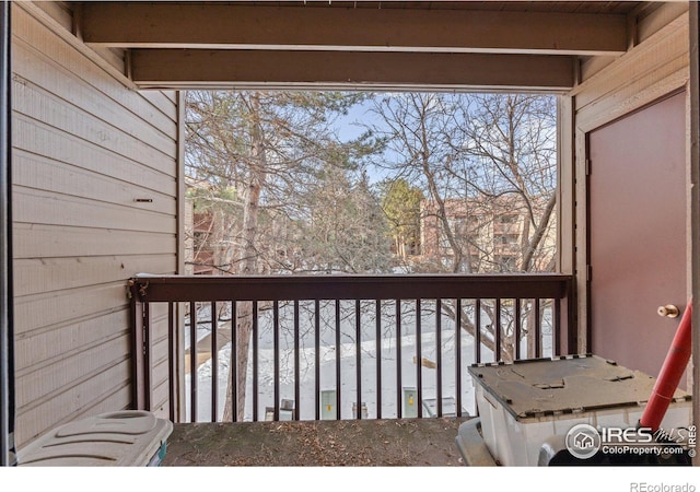 view of snow covered deck