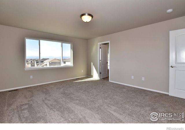 view of carpeted empty room