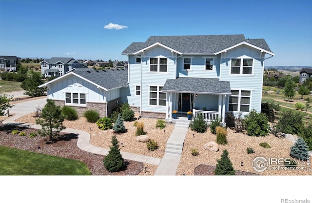 front of property featuring covered porch