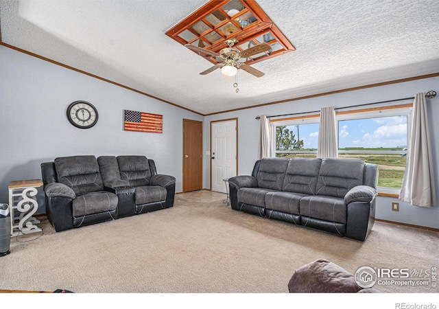 living room featuring ceiling fan, plenty of natural light, light colored carpet, and vaulted ceiling