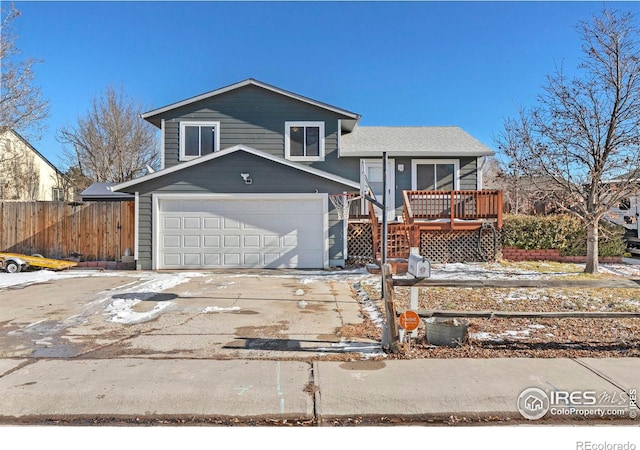 tri-level home featuring a garage