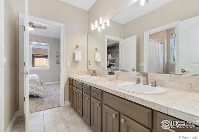 bathroom featuring vanity, tile patterned floors, and ceiling fan