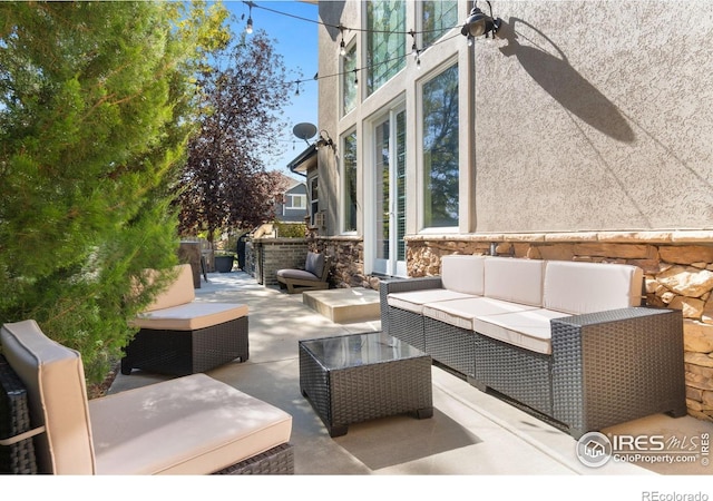 view of patio with an outdoor hangout area