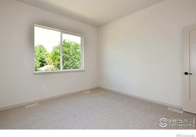 view of carpeted empty room