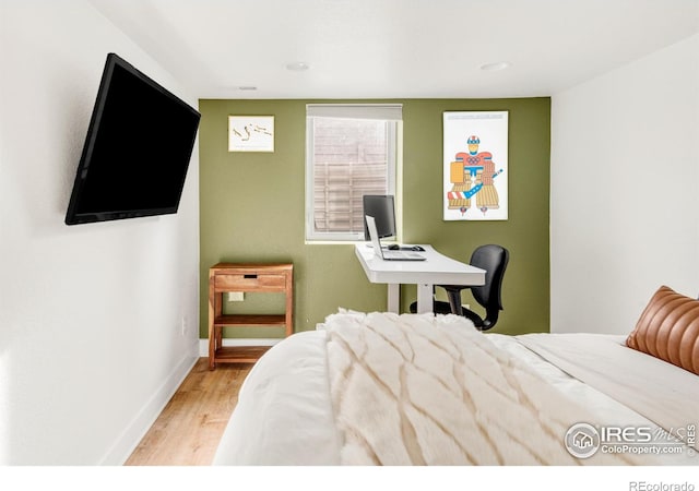 bedroom featuring light hardwood / wood-style flooring