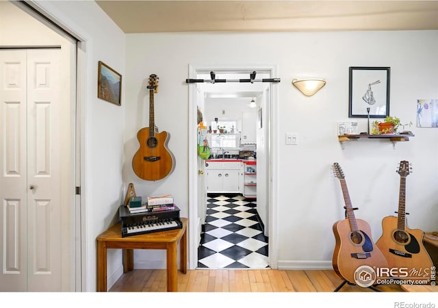 hallway featuring sink