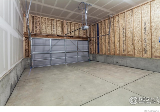 garage featuring a garage door opener