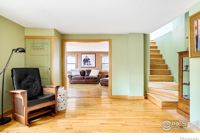 living area featuring hardwood / wood-style floors