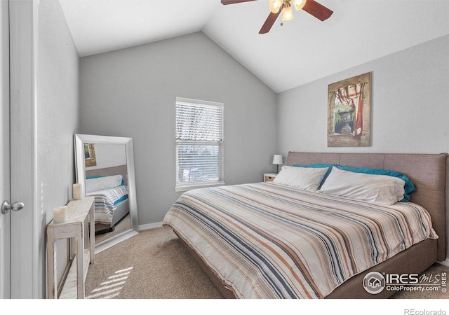 bedroom with carpet floors, vaulted ceiling, and a ceiling fan