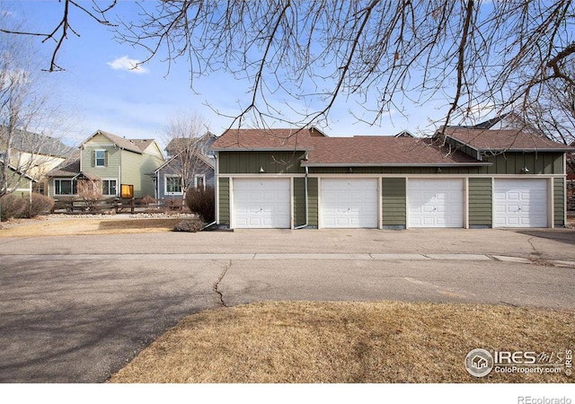 garage featuring a residential view