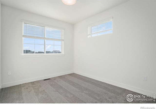 view of carpeted empty room