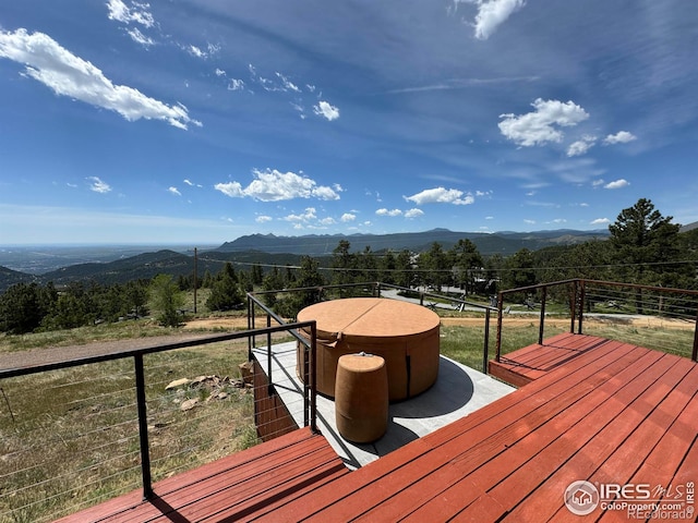 wooden terrace with a mountain view