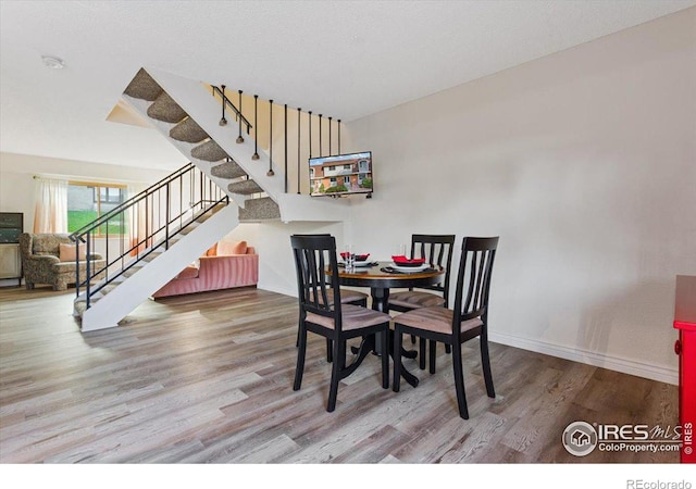 dining room featuring light wood-type flooring