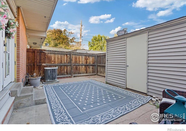 view of patio / terrace with central AC unit