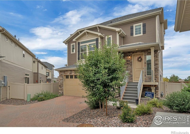 craftsman house featuring a garage