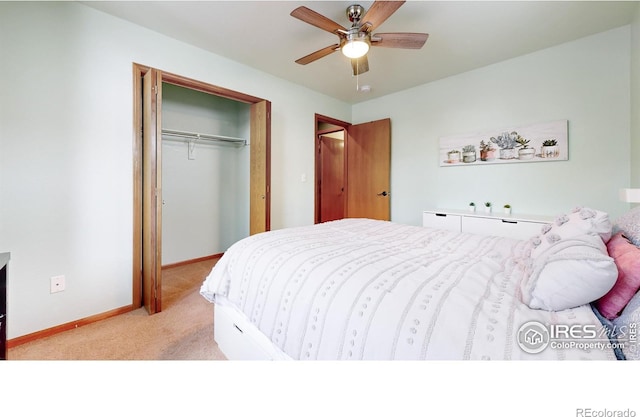 bedroom featuring ceiling fan, light colored carpet, and a closet