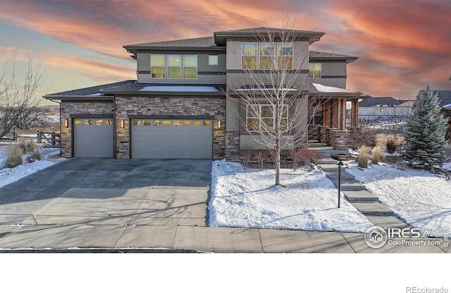 prairie-style house featuring a garage