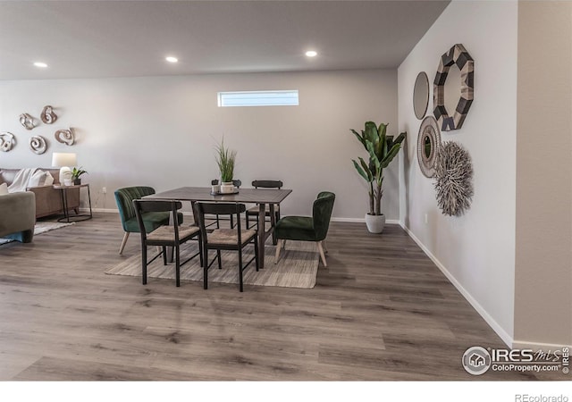 dining room featuring hardwood / wood-style flooring