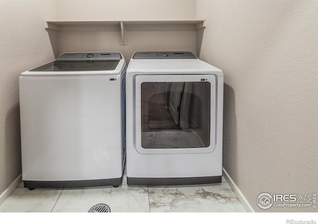 laundry room featuring washer and dryer