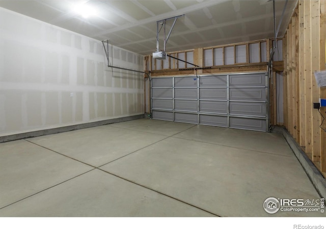 garage featuring a garage door opener